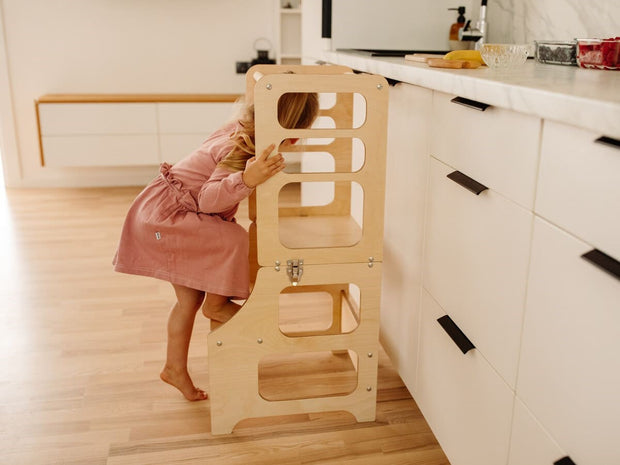 Convertible learning tower for safe play