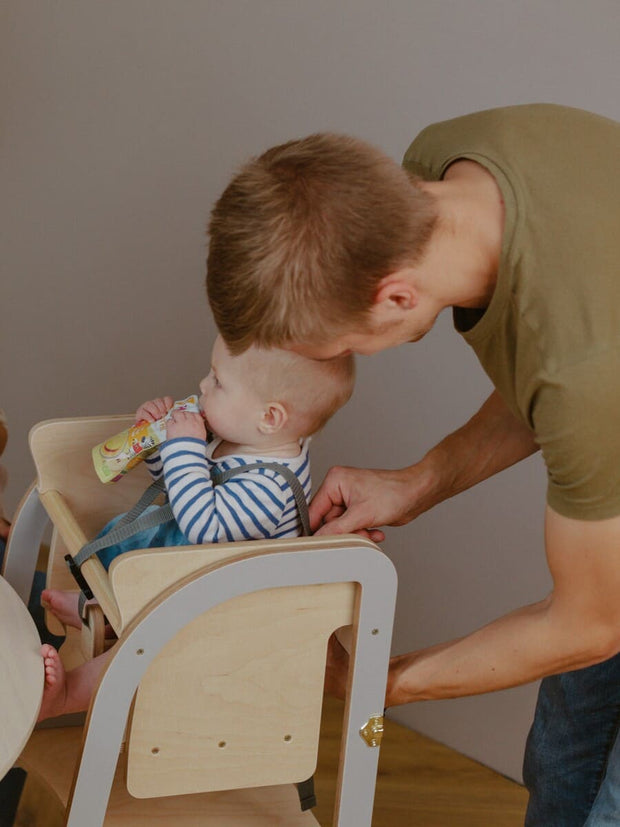 Sturdy step stool and highchair combination.