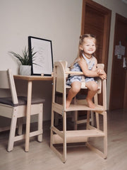 Highchair that transitions into a toddler step stool.