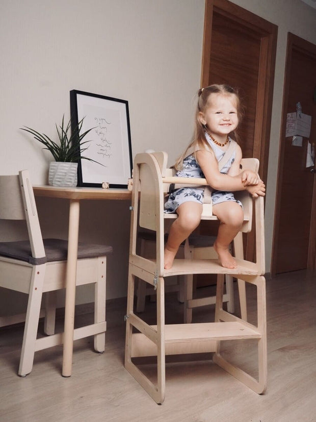 Highchair that transitions into a toddler step stool.