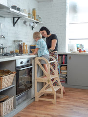 Convertible learning tower turns into table and chair