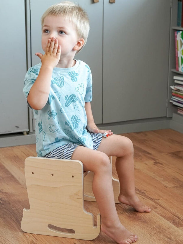 Innovative learning tower that becomes a table and chair