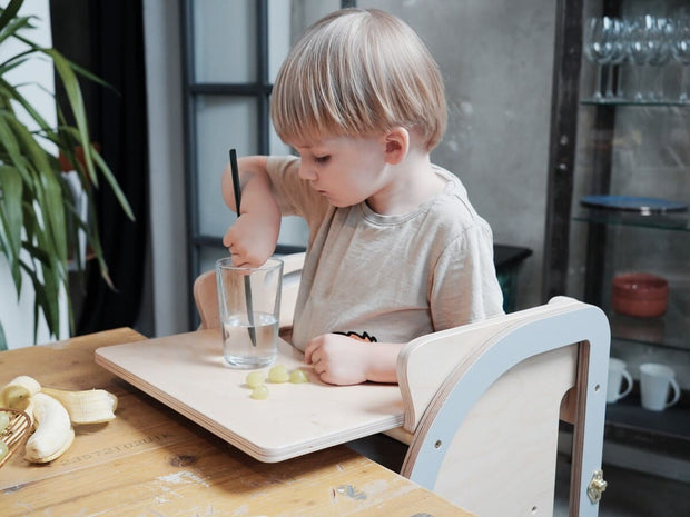 Highchair tray designed for easy use.