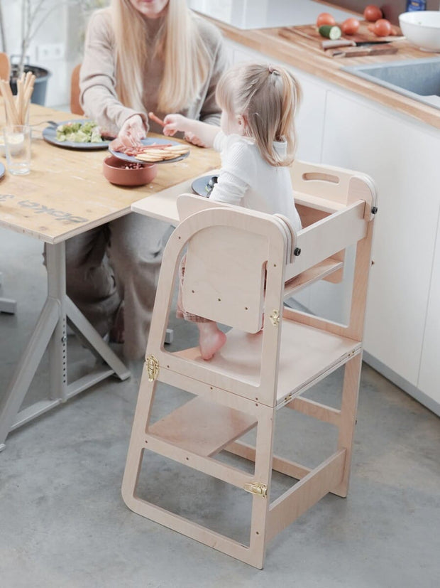 Durable highchair tray with smooth surface.
