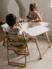 Toddler engaging with sensory activities.