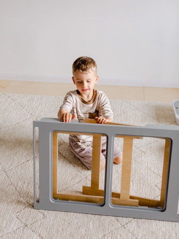 Gray table for creative play.