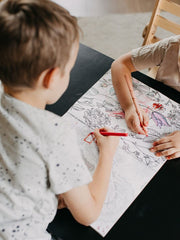 Interactive black table for toddlers.