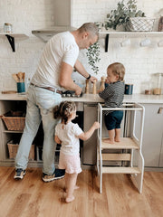 Montessori learning tower for toddlers to explore and learn safely.