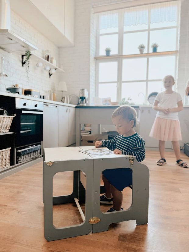 Elegant wooden Montessori helper tower for toddlers and small children.