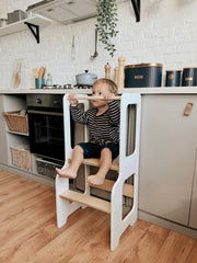 Toddler-friendly step stool with a secure grip and ergonomic design.