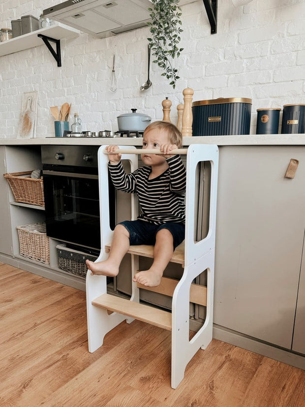 Toddler-friendly step stool with a secure grip and ergonomic design.