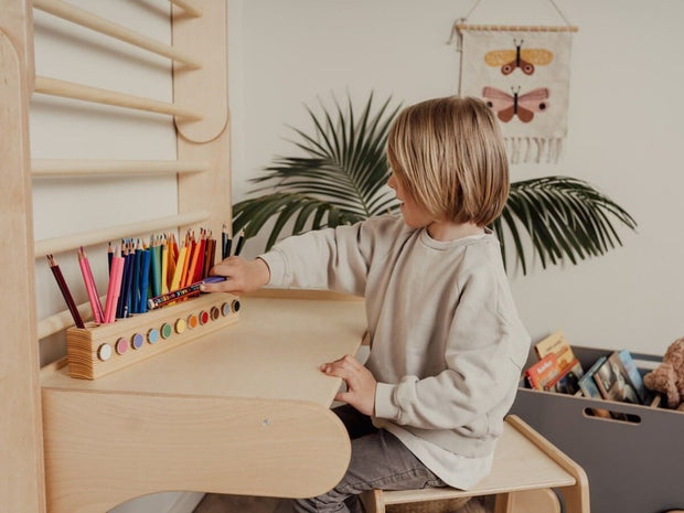 Compact table and chair set for Swedish wall