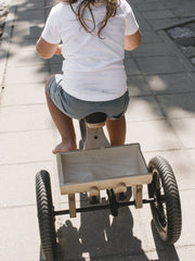 Safe tricycle add-on for children's balance bike