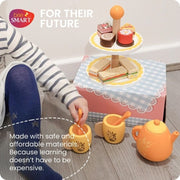 Kids' wooden afternoon tea set with toy teapot and pastries.