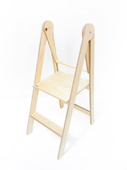 Foldable standing platform for toddler kitchen use